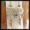 Boucles d’oreilles en acier doré et Œil de Faucon – Style élégant et tendance
