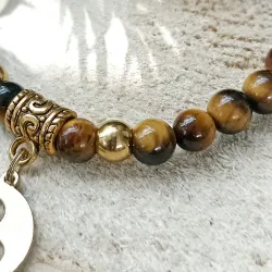 Bracelet en Œil de Tigre et Acier Doré – Triskel