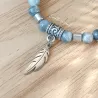 ✨ Bracelet en Œil de Faucon avec Breloque Plume