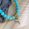 ✨Bracelet en Howlite turquoise – Oiseau doré